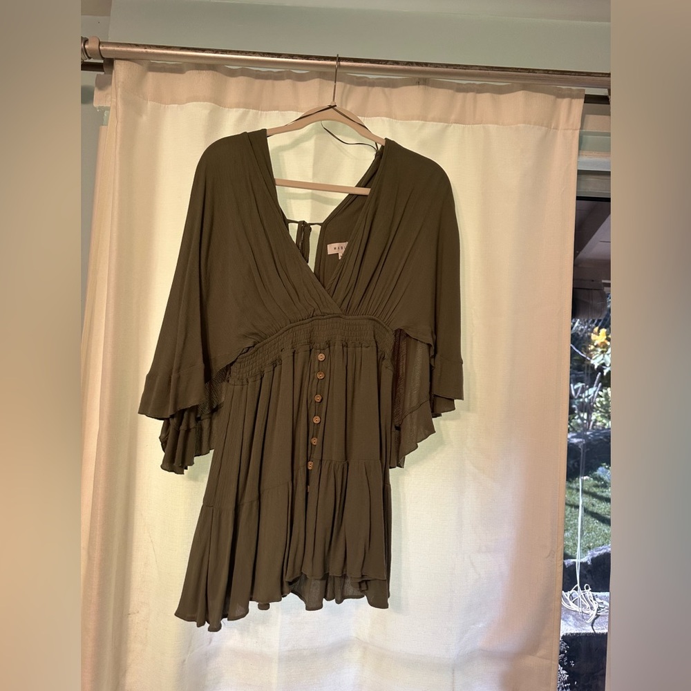 Small flowy green romper